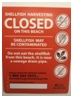 Warning sign: Shellfish closed due to sewer outfall